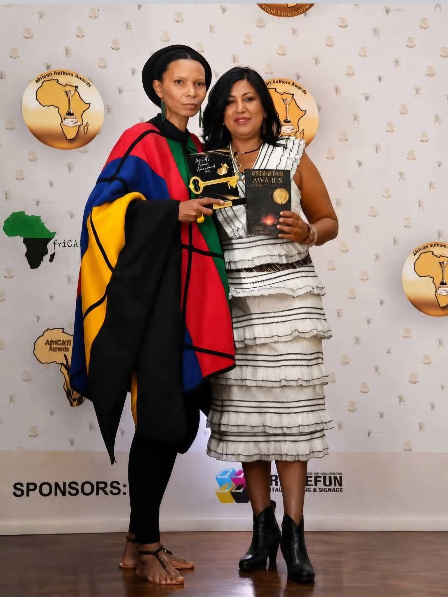 Gaishrie Sharon Singh receiving recognition at the African Authors Awards
